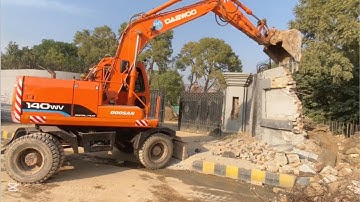 Excavator Falling Down A Big Wall 
