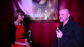 Roger Rhodes chatting with Taylor Swift about her new album Red