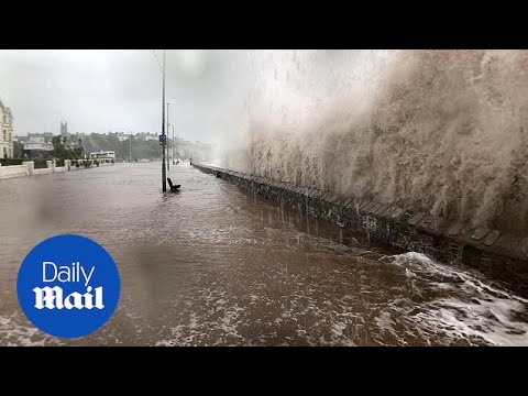 Waves pound the seafront at Exmouth during Storm Callum