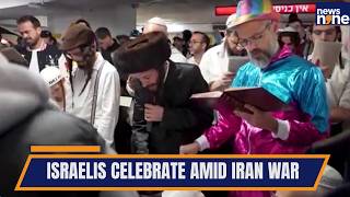 Purim in a Bomb Shelter: Israelis Celebrate Amid Iran War Escalation