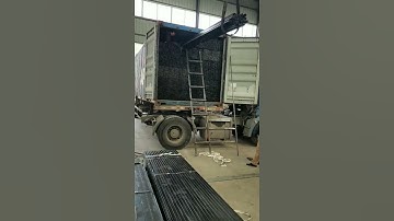 black pipe loading into container 1