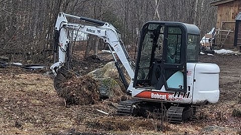 Bobcat 331 Moving Large Rock