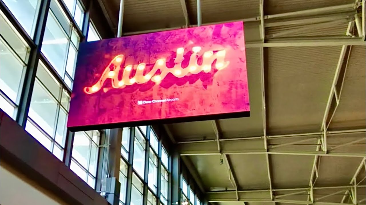 Austin, TX airport arrival, baggage claim, rental car, heading into