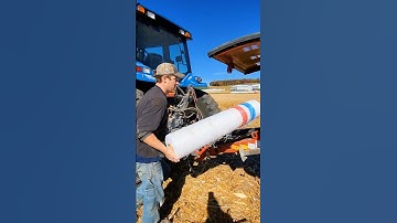 Loading the round baler with net wrap! #agriculture #newholland #farm #bale #farming #farmer
