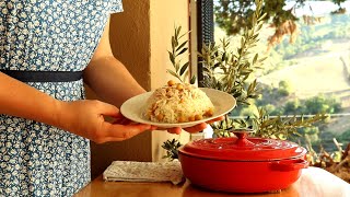 Cooking traditional Turkish pilaf with chicken in the village. Turkish street food