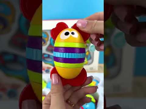 Набір брязкалець 6 шт для розвитку малюків тріскачки пискавки пальчикові ігри гумові шнурочки кольорові сфери в коробці, видео 1