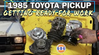 1985 Toyota SR5 22RE gets new AC compressor, alternator, and valve adjustment....
