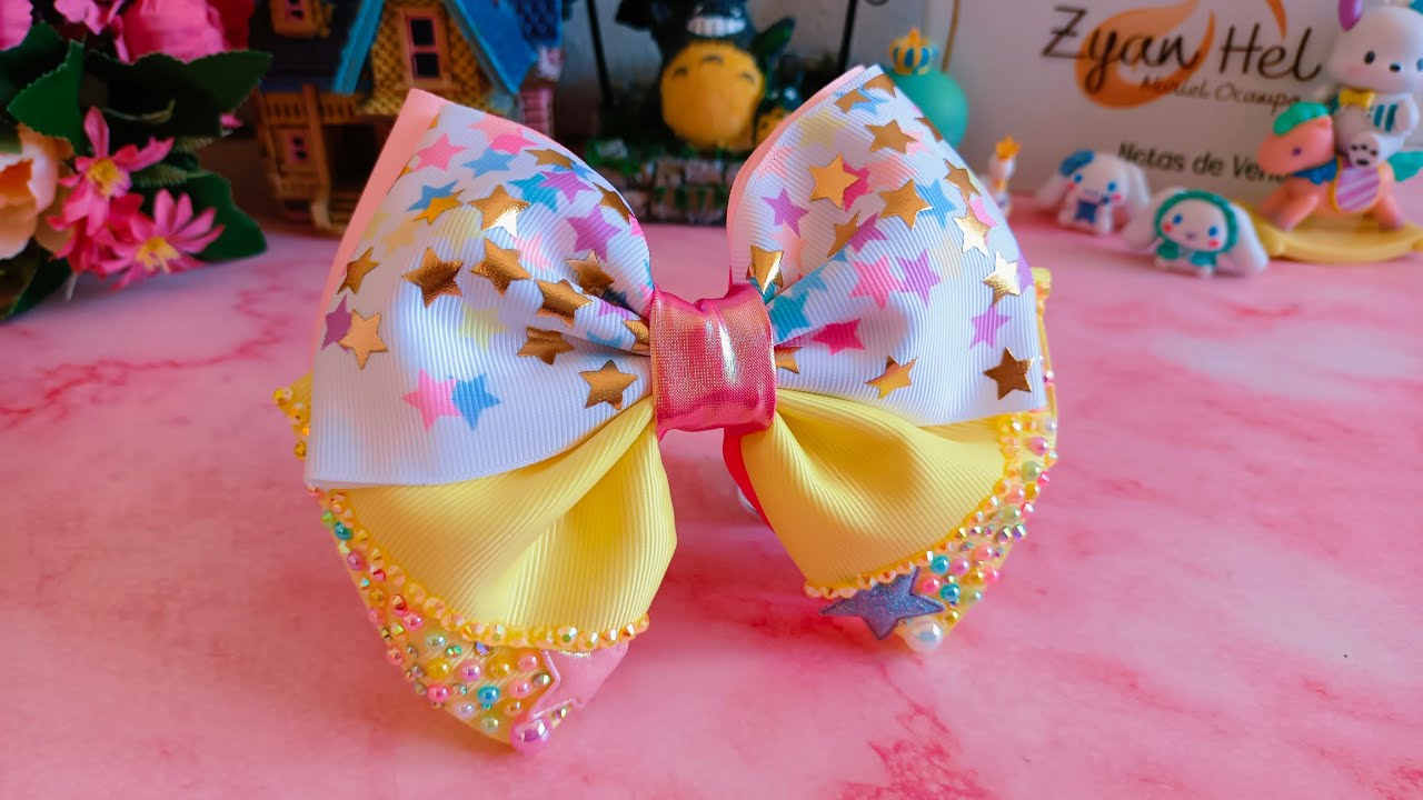 moñito medio olán, con listón de 7.5cm de ancho, bonito y facil de realizar. 