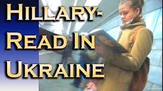 Ukrainian Girl In Metro, Read Hillary Clintons Book.