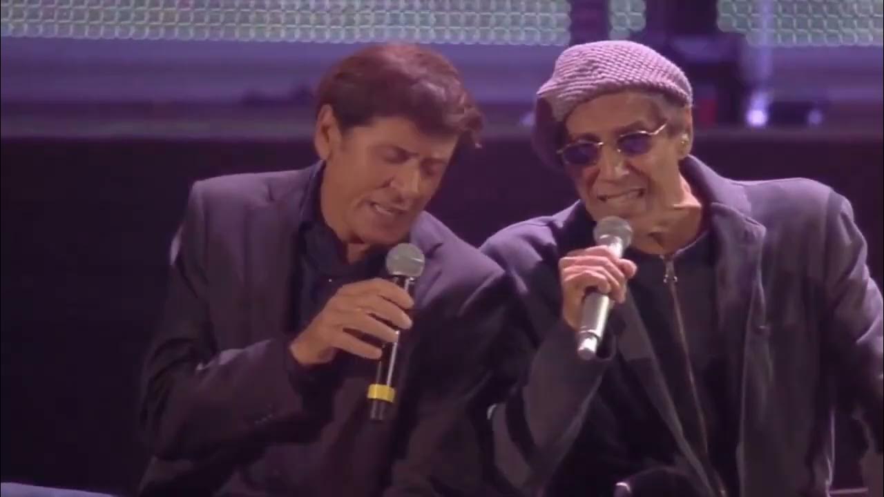 Бьяджо антоначчи и адриано челентано. Челентано песня дуэт. Челентано песня дуэт. Челентано песня дуэт. Io non so parlar d amore адриано челентано.