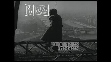 1950s Daredevil Dangling From the Eiffel Tower From His Teeth