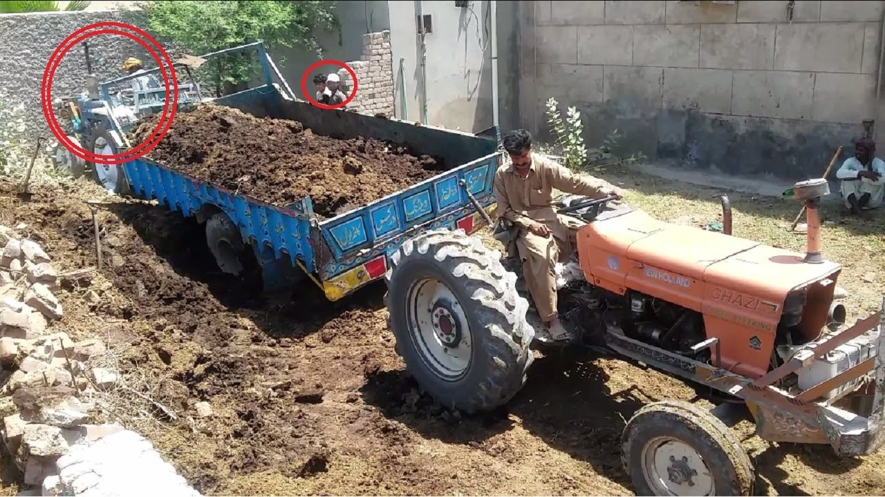 Farm Tractor Fails Video/The foolish driver finally reverse the tractor