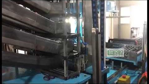 Automatic aluminum fin alignment and tube mounting machine