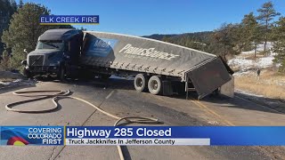 Highway 285 reopens after closure for jackknifed semi, fuel spill