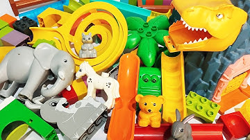 Satisfying Building Blocks Marble Run - Halfpipes, funnel spiral, wild animals & Dinosaurs cave