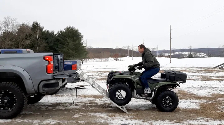 Loading ATV in lifted truck