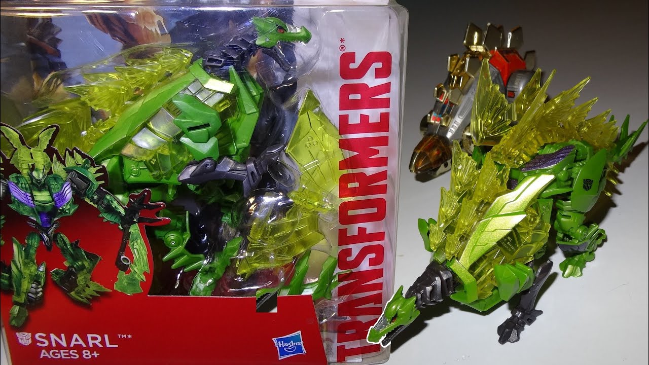 Transformers Generations Power Of The Primes – Dinobot Snarl Deluxe Class, Figura 14 Cm, Con Armatura E Carta - 2