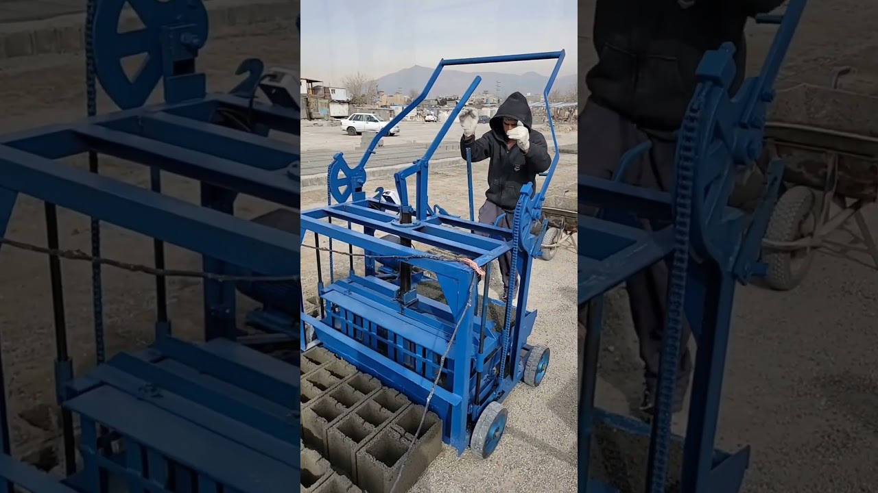 Concrete block making machine/ 