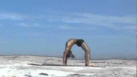 Simon Borg-Olivier  in the Yoga Synergy Ether Sequence Back Flip to Scorpion