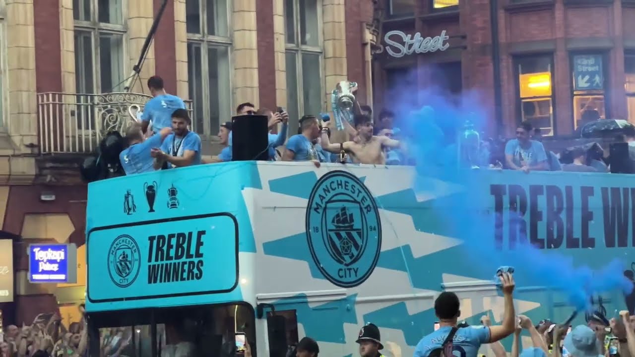 Man City football team open top bus, treble celebration parade Manchester 11 June 2023