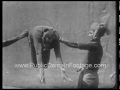 Man jumping through hoop 1930 archival footage  publicdomainfootagecom