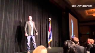 Lone Survivor Marcus Luttrell, retired Navy SEAL, begins his talk at The Denver Hospice Mask Proje