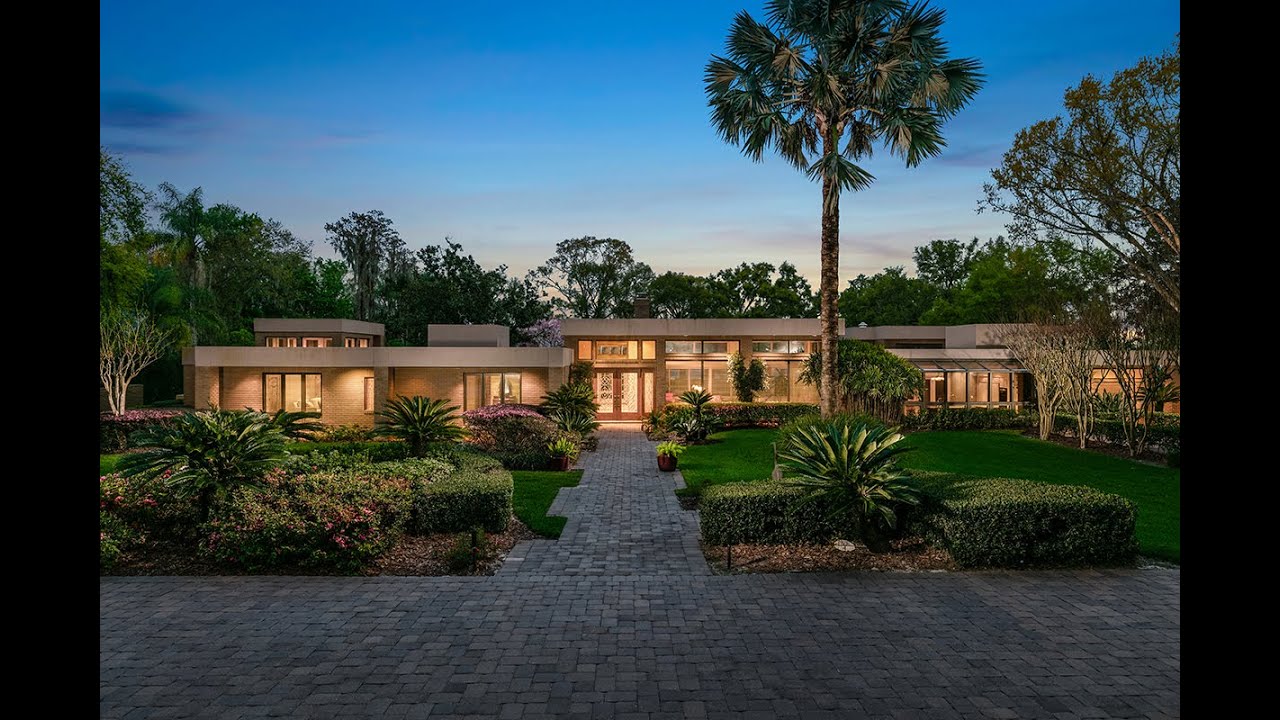 BREATHTAKING Windermere estate located within the gates of Chain du Lac