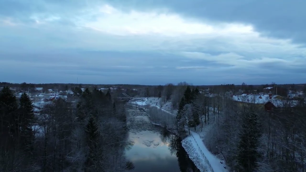 Winter Aerial View of Snowy River Landscape · Free Stock Video