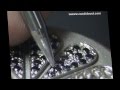 Zandidoust -- Sertissage cadran et diamant noir