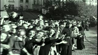 French girls kiss a US Tank Commander as Allies enter Paris, France during World ...HD Stock Footage