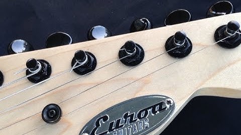 How to enlarge holes for guitar tuners