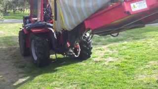 Olive harvester emptying into bin at Telegraph Hill Olivery