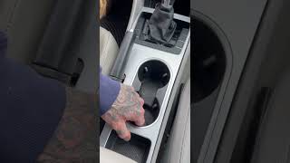 How to remove B7 VW Passat center console trim / cup holder center piece.