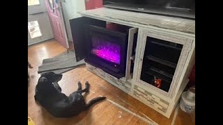 Ethan Allen cabinet was turned to a fire place tv cabinet with bling