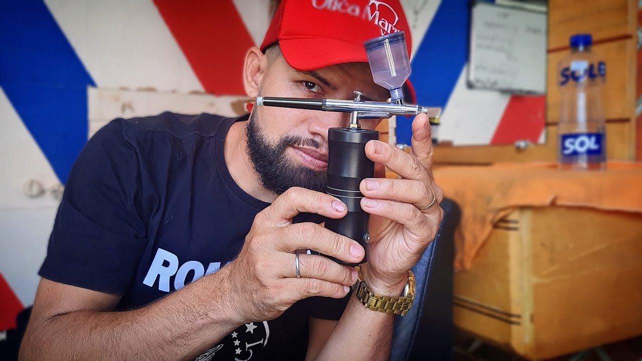 como fazer a limpeza de um airógrafo portátil?