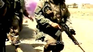 Iraq War - Battling insurgents - behind smokescreen archival footage