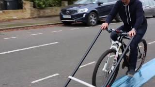 This bike lays its own cycle lane!