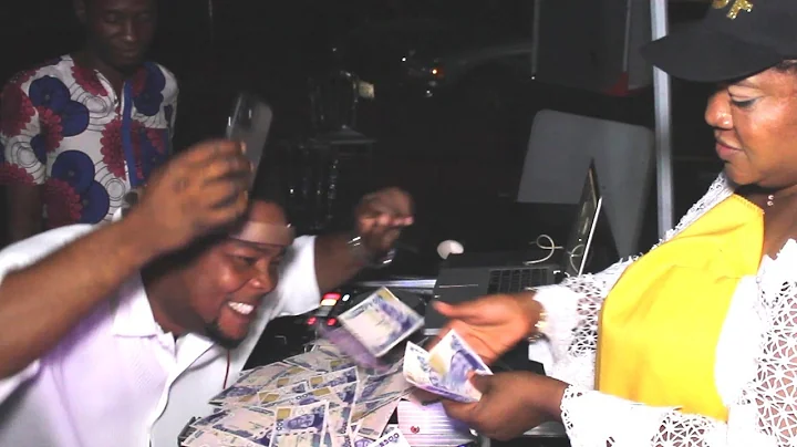 MONEY SPEAKING: SEE HOW TOYIN ABRAHAM RAIN MONEY ON THE DJ AT NKECHI BLESSING MOTHER`S BURIAL