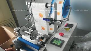 Semi automatic tabletop juice empty plastic bottle labeling machine round bottle rolling labeler