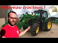 Nouveau tracteur sur la ferme  regains derrire ensilage n74