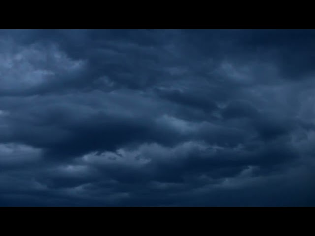 footage-stormy-sky-moving-clouds 4k class=