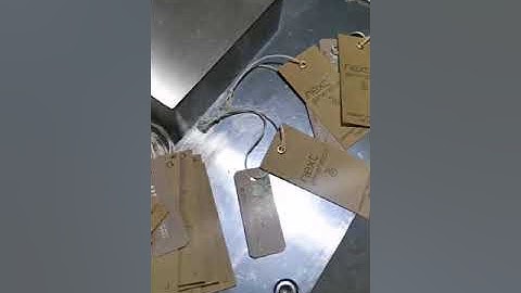 Double hangtag threading knotting machine with Eyelet