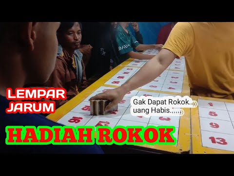 Permainan Pasar malam Lempar Jarum Hadiah Rokok