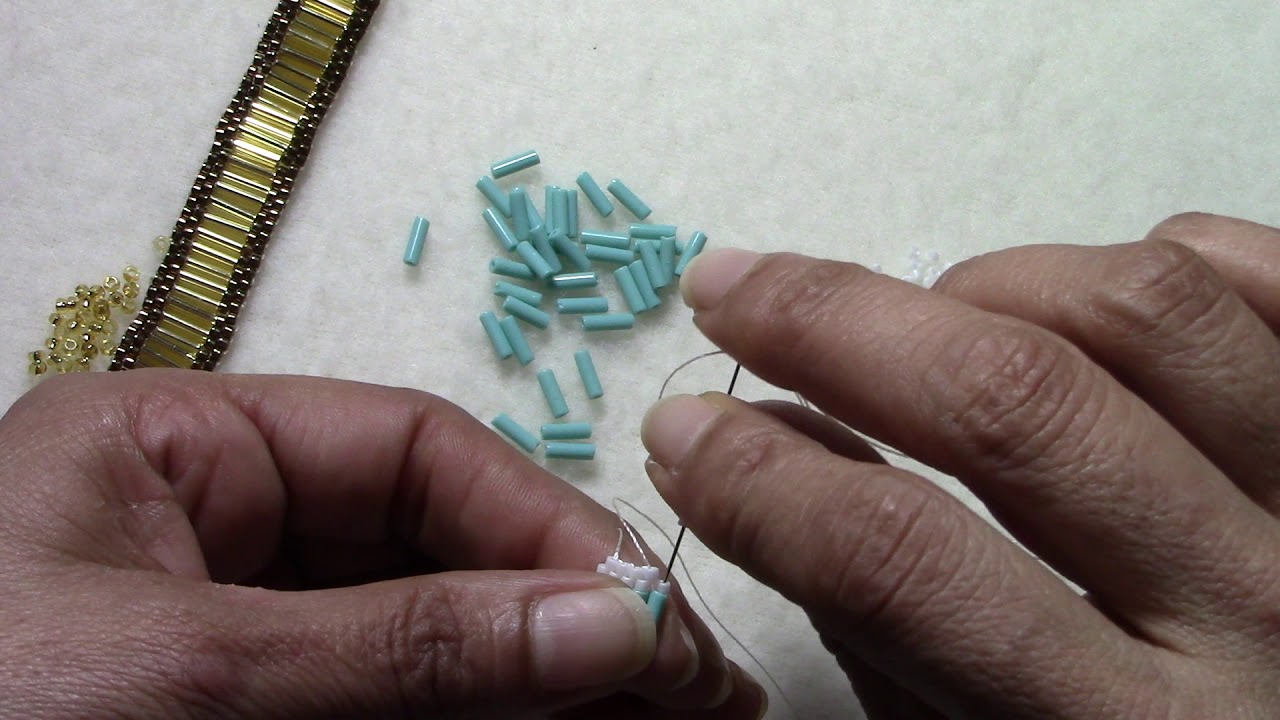 brazalete en miyuki, con canutillos.