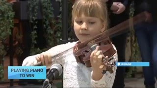 Playing Piano to Win: Young Ukrainian musicians participate in improvised concert(Music in a shopping mall as a chance to earn money. In the city of Dnipropetrovsk, that is central Ukraine, the talented children played an improvised concert., 2016-03-28T13:29:06.000Z)