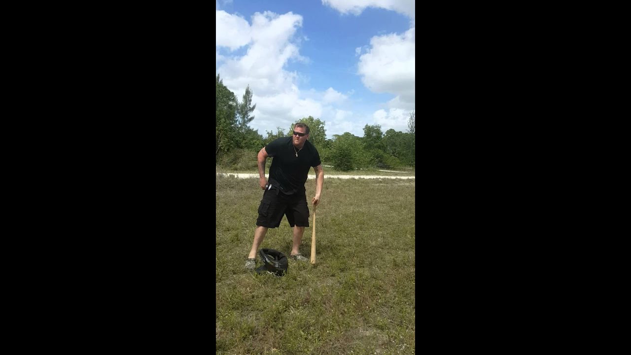 Hitting golf balls and baseball's with professional wood bat a quarter