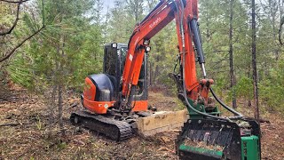 Buck brush chewing with the Kubota KX 040 4 and Brush Hound FX26 Defender