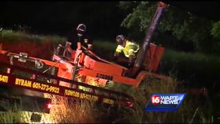 18 wheeler hits truck left on roadside