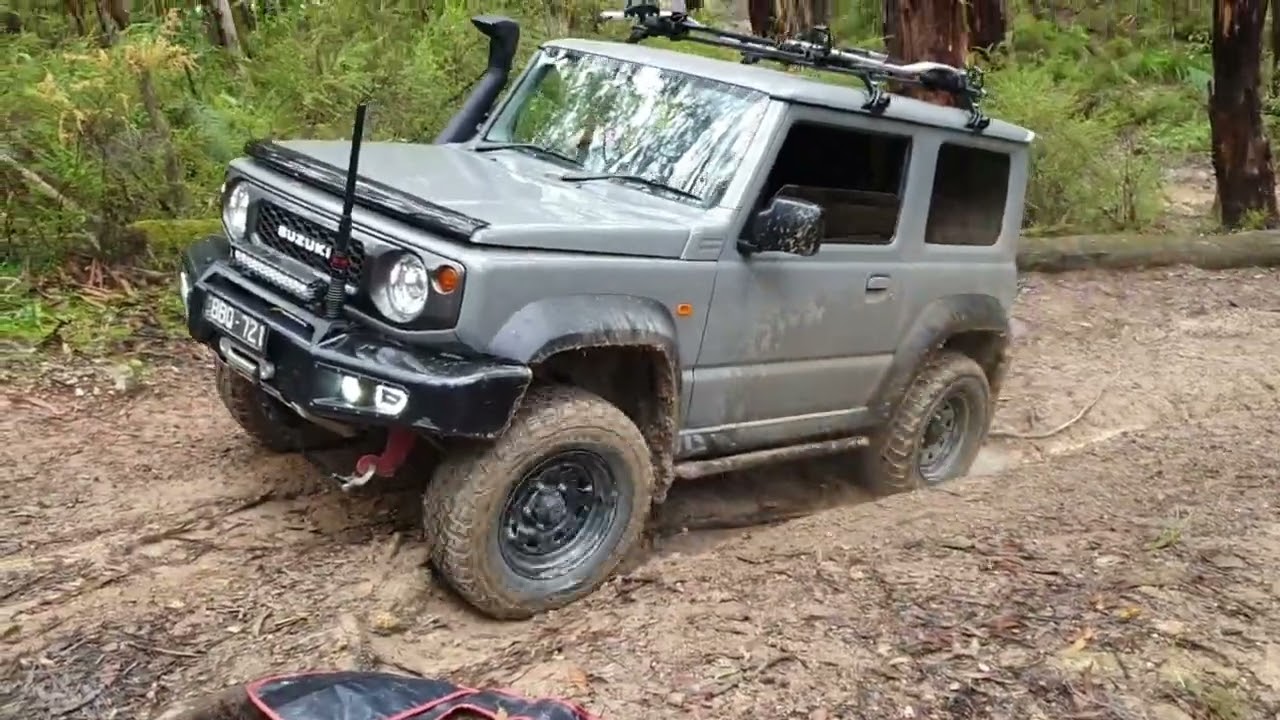 Lederderg and Wombat forest winching the Jimny out of the mud
