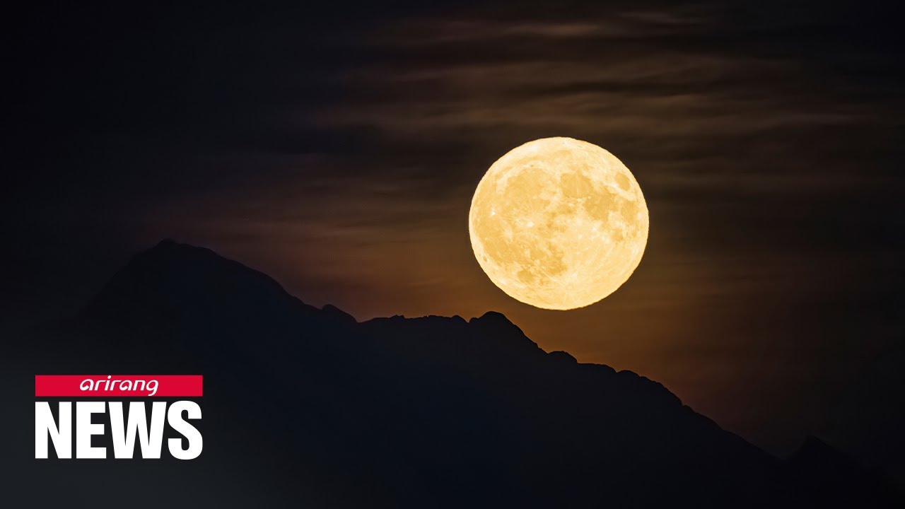 First supermoon of 2024 lights up night skies - YouTube